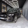 Audi Q7 — общ изглед отпред и отстрани в студиото на PaintKillers