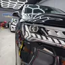 Audi Q7 — близък изглед на предния фар, калника и капака