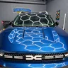 Dacia Bigster — преден капак и решетка, изглед отпред